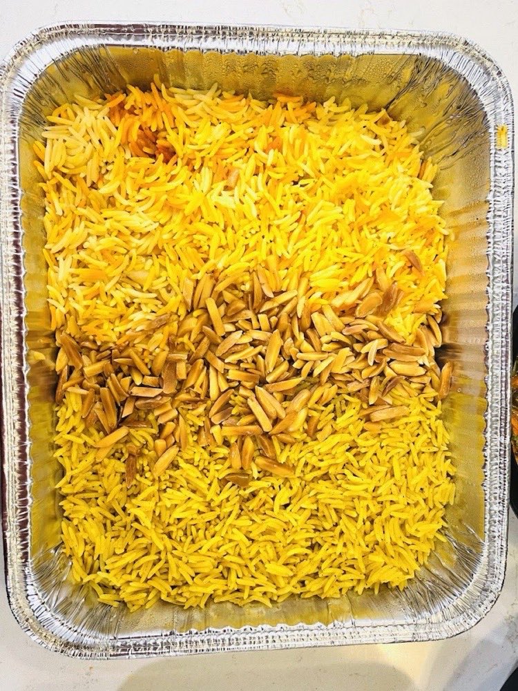 A full tray of saffron rice.