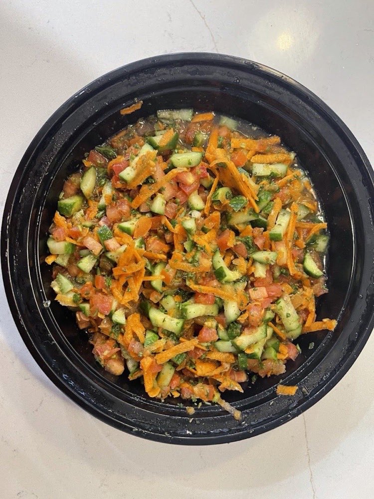 Chopped tomato and cucumber salad.